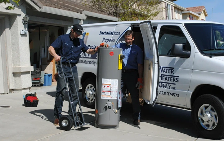 Licensed plumber repairing a water heater in a Santa Clara, CA home
